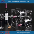 clear plexiglass wine racks in bar